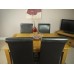 Rustic - Oak Fixed Table Dining Set With 4 Black Leather Chairs / Scroll Back