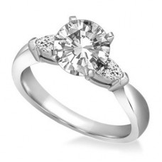 Elegant Round & Pear Diamond Trilogy Ring
