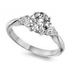 Elegant Round & Pear Diamond Trilogy Ring