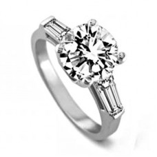 Round And Tapered Baguette Diamond Trilogy Ring
