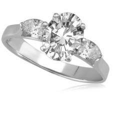 0.50ct Si2/g Oval/pear Diamond Trilogy Ring
