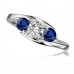 Modern Round Diamond & Blue Sapphire Trilogy Ring