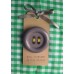 Button Brooch In Grey