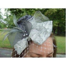 Blue Bow Fascinator With Net And Feathers Blue Bow Fascinator With Net And Feathers